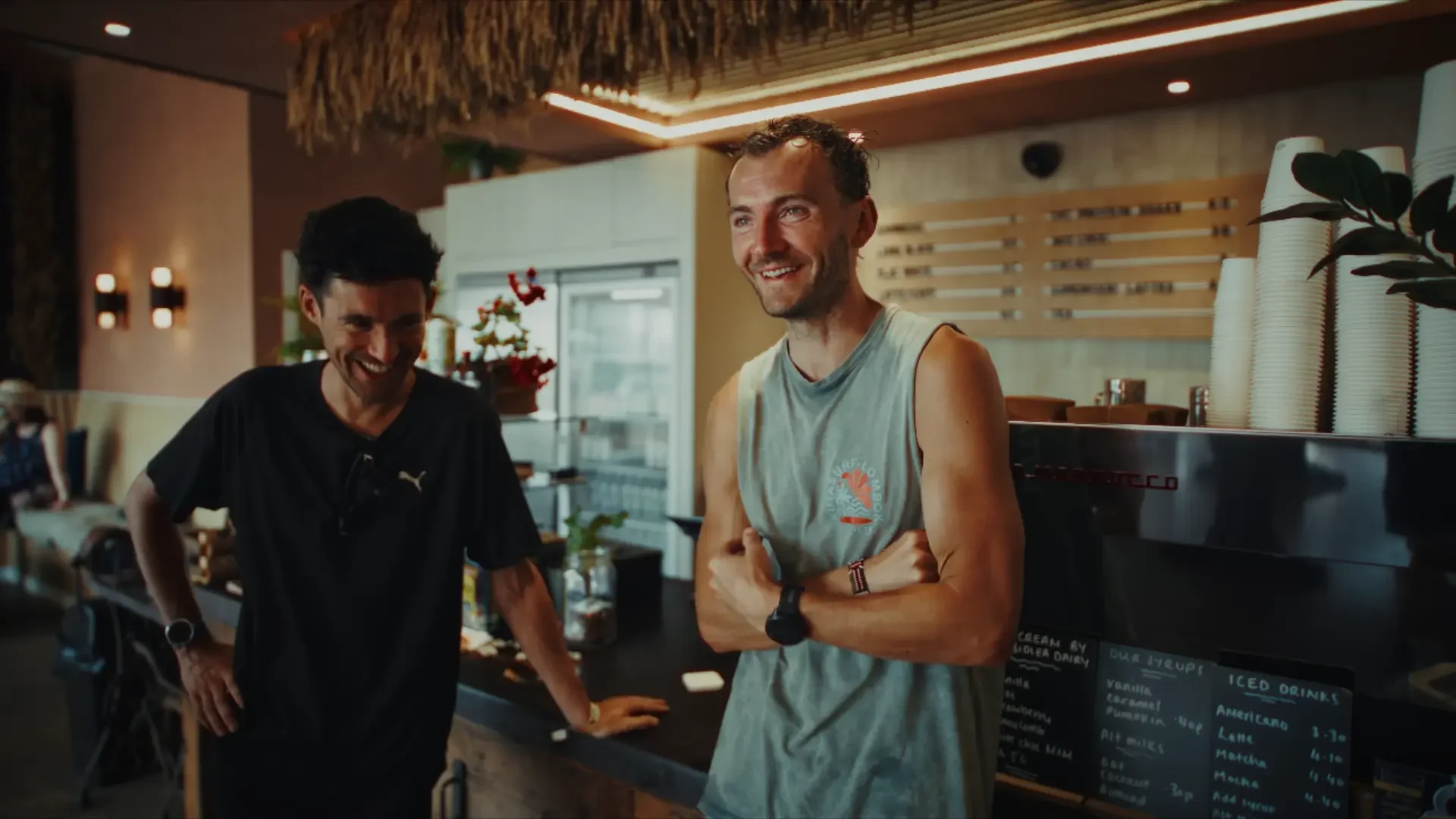 Two Development Squad athletes laughing together at The Farm Club